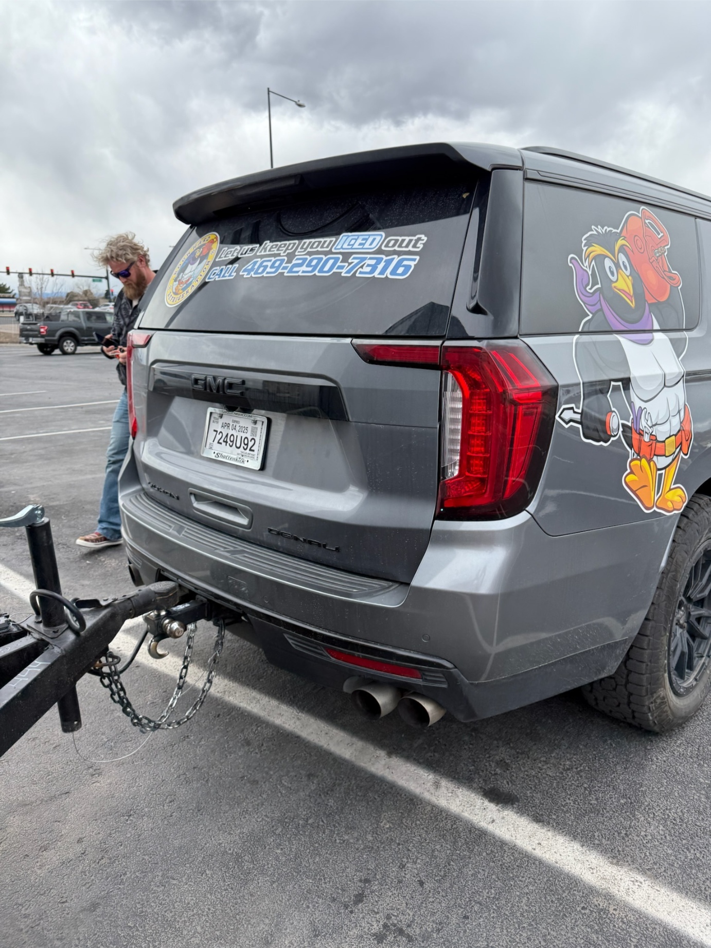 Rock Hard Refrigeration wrapped GMC Denali service vehicle