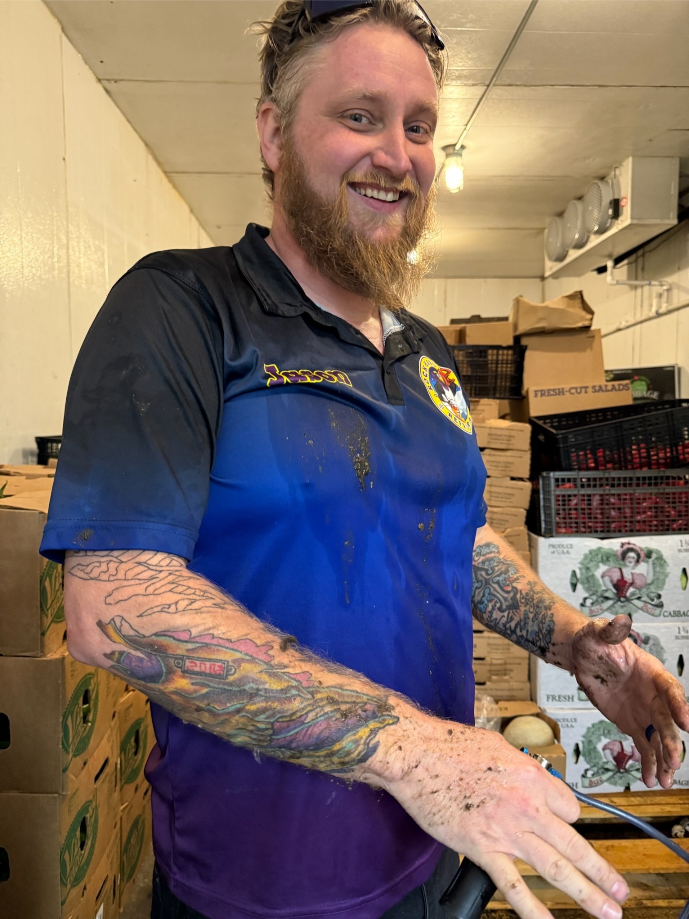 Rock Hard technician performing post-repair check inside walk-in cooler