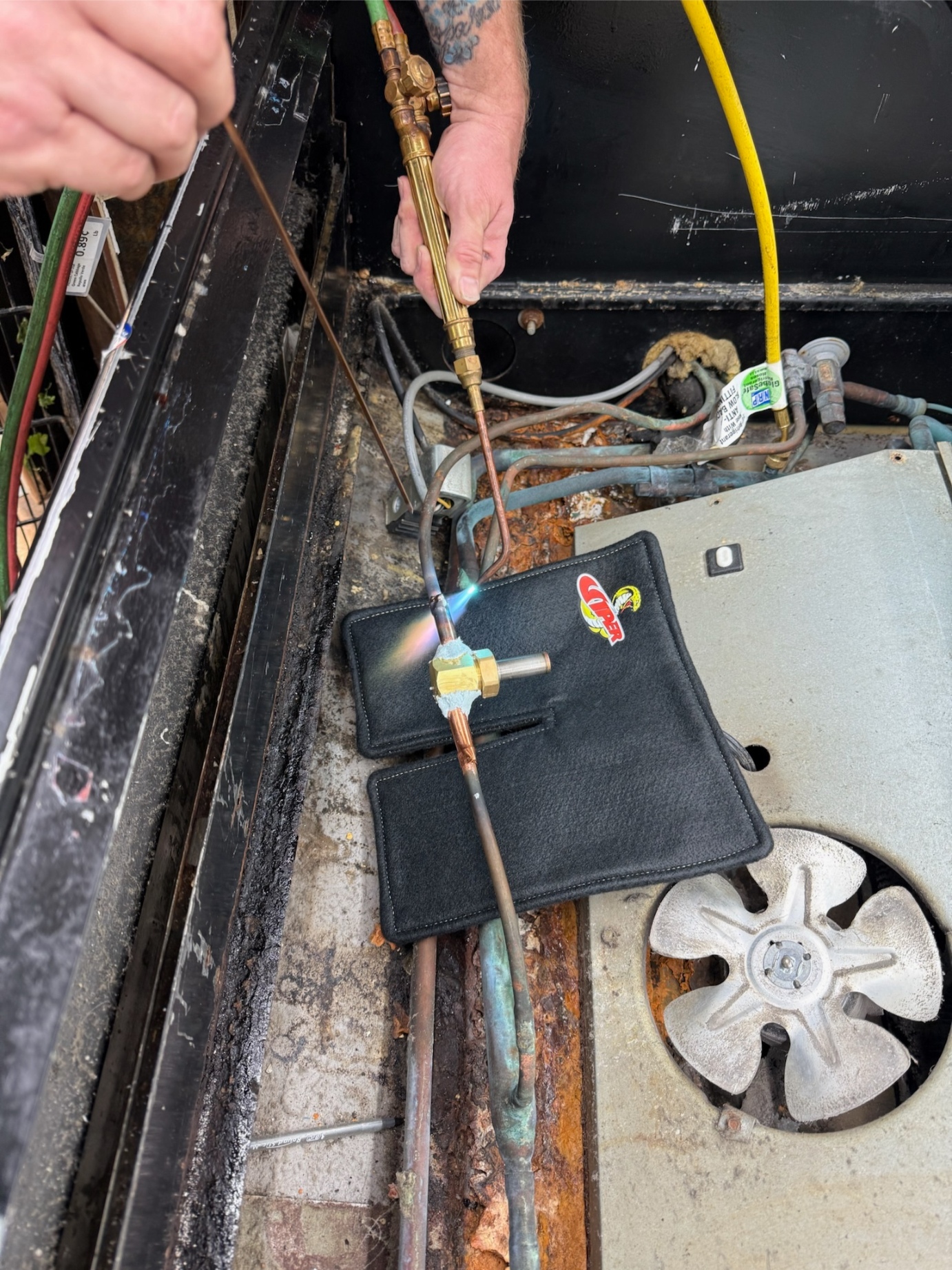 Brazing copper refrigerant line — Rock Hard technician